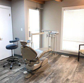 Dental treatment room with wood flooring